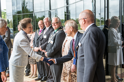The Princess Royal arrives at the Renishaw Innovation Centre and is introduced to Sir David McMurtry Photo of HRH Princess Anne meeting Renishaw staff
