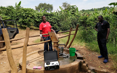 Use of portable fluorimeter to test the quality of water sampled from a shallow well by co-author Jacintha Nayebare in Lukaya Town, Uganda.